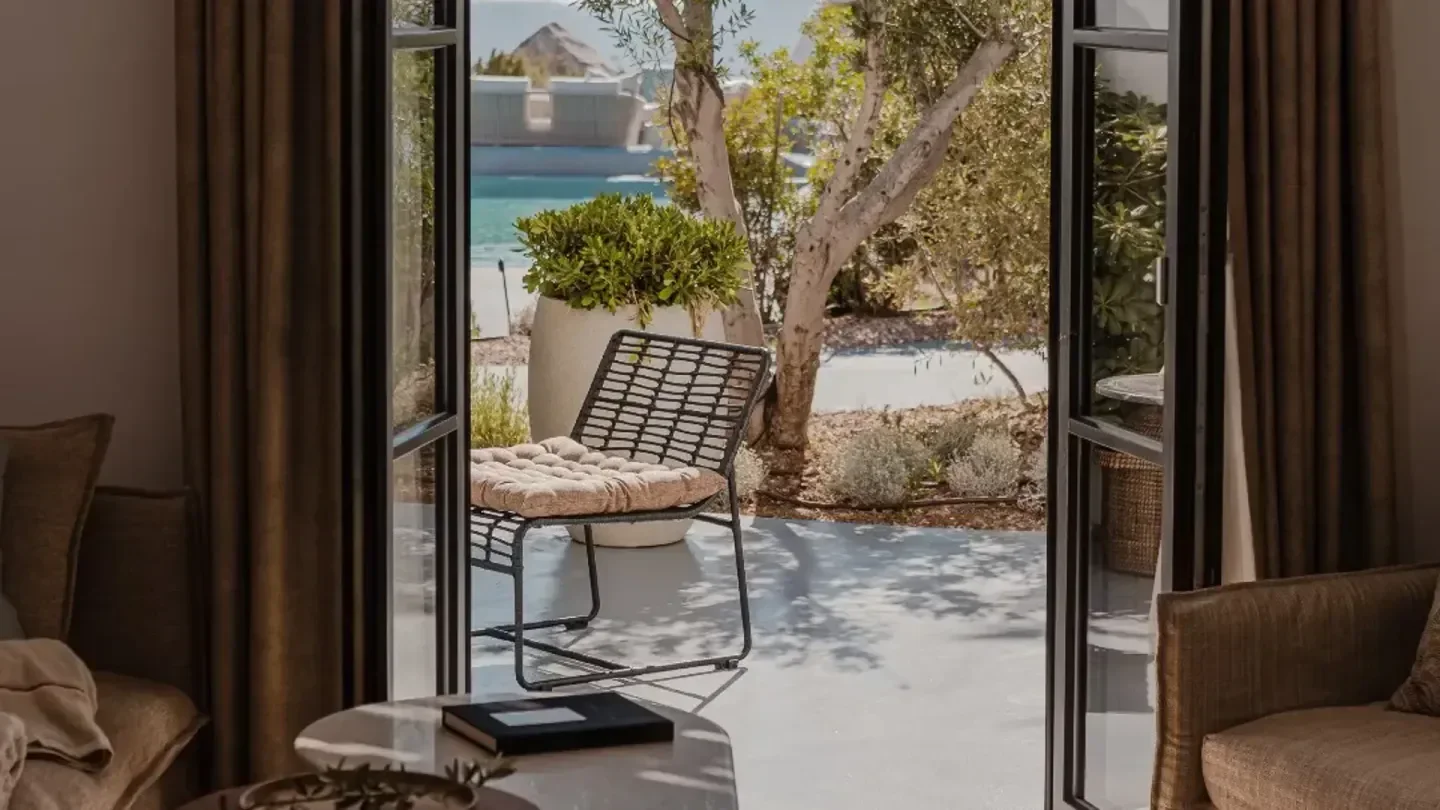 Outdoor seating area at Nobu Santorini restaurant, open to the beautiful Santorini landscape